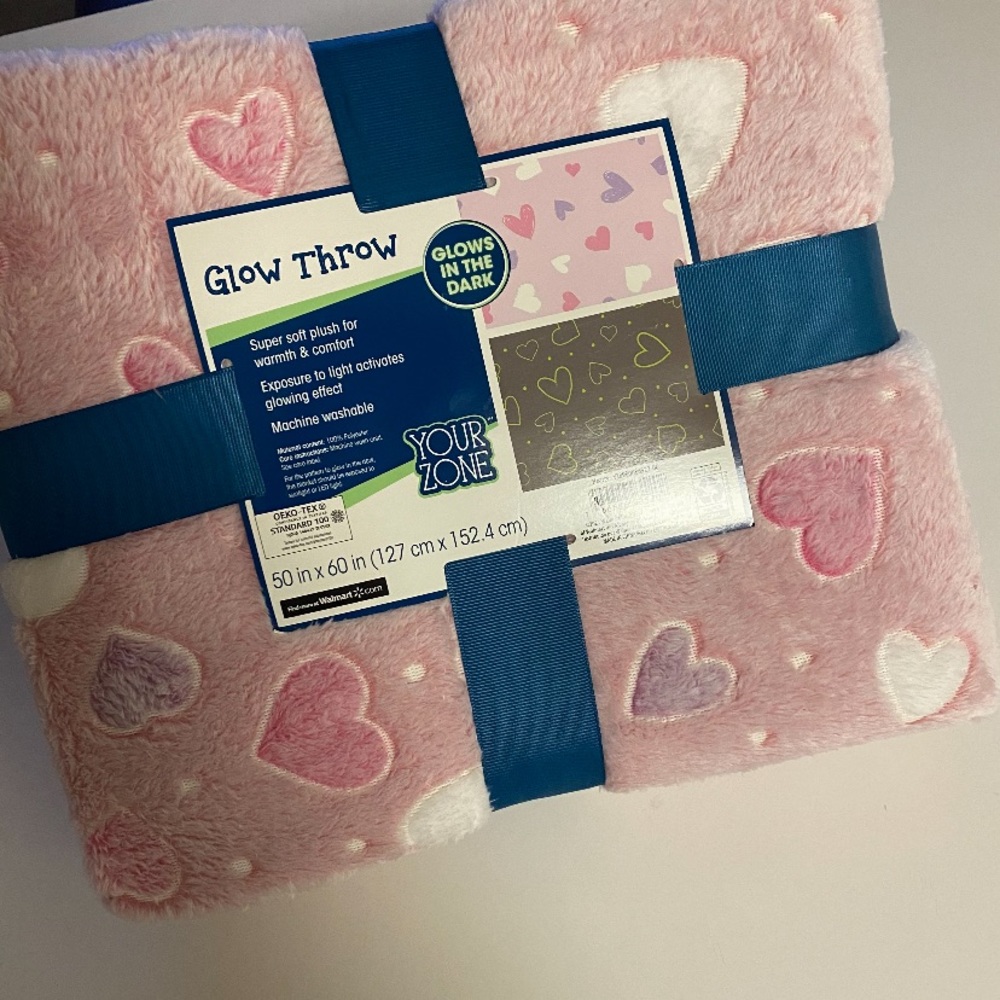 Throw over glow in the dark pink blanket